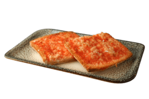 Pan de coca con tomate